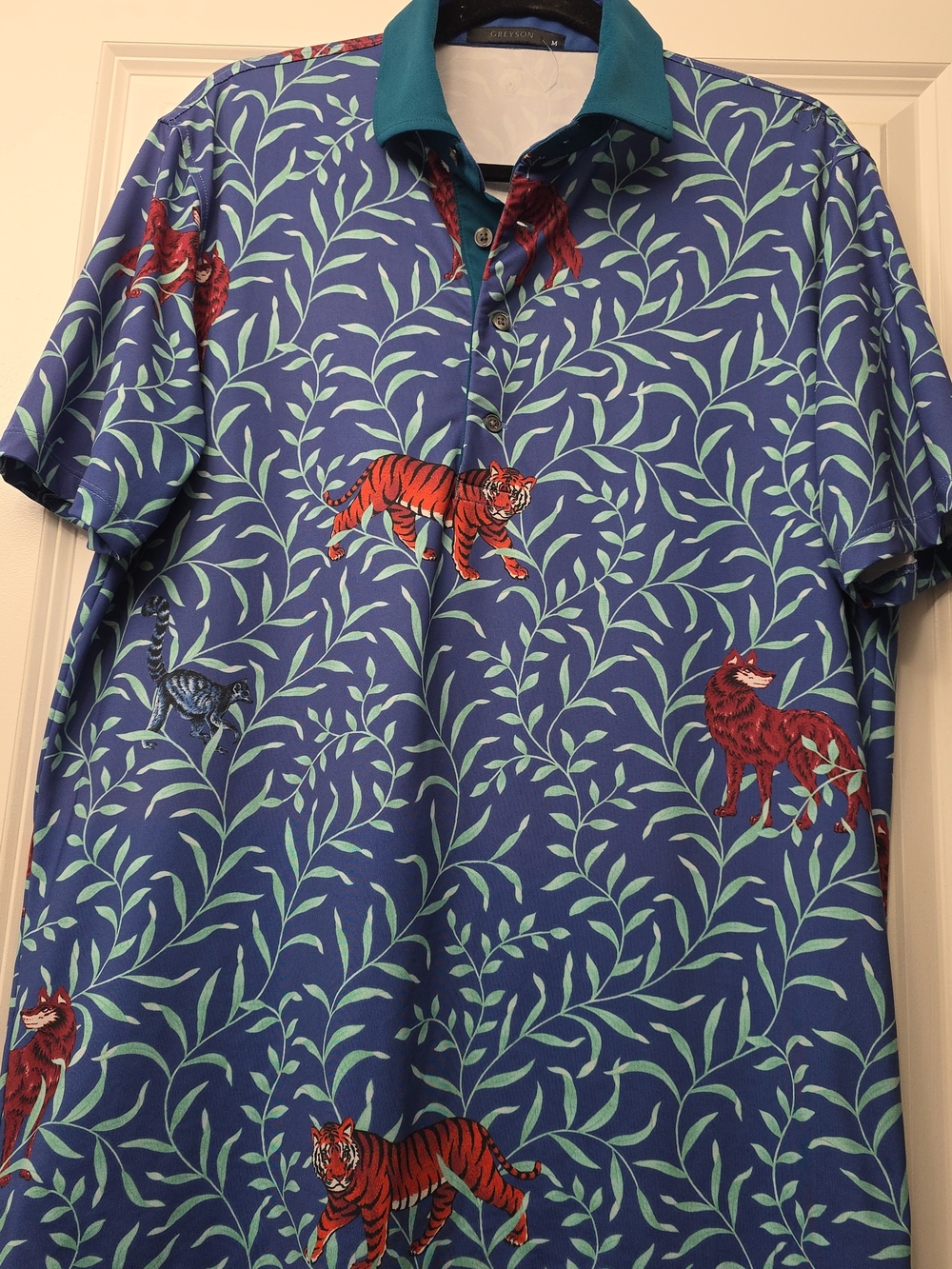 Greyson Blue Polo with Teal Collar and Red Animal Motifs